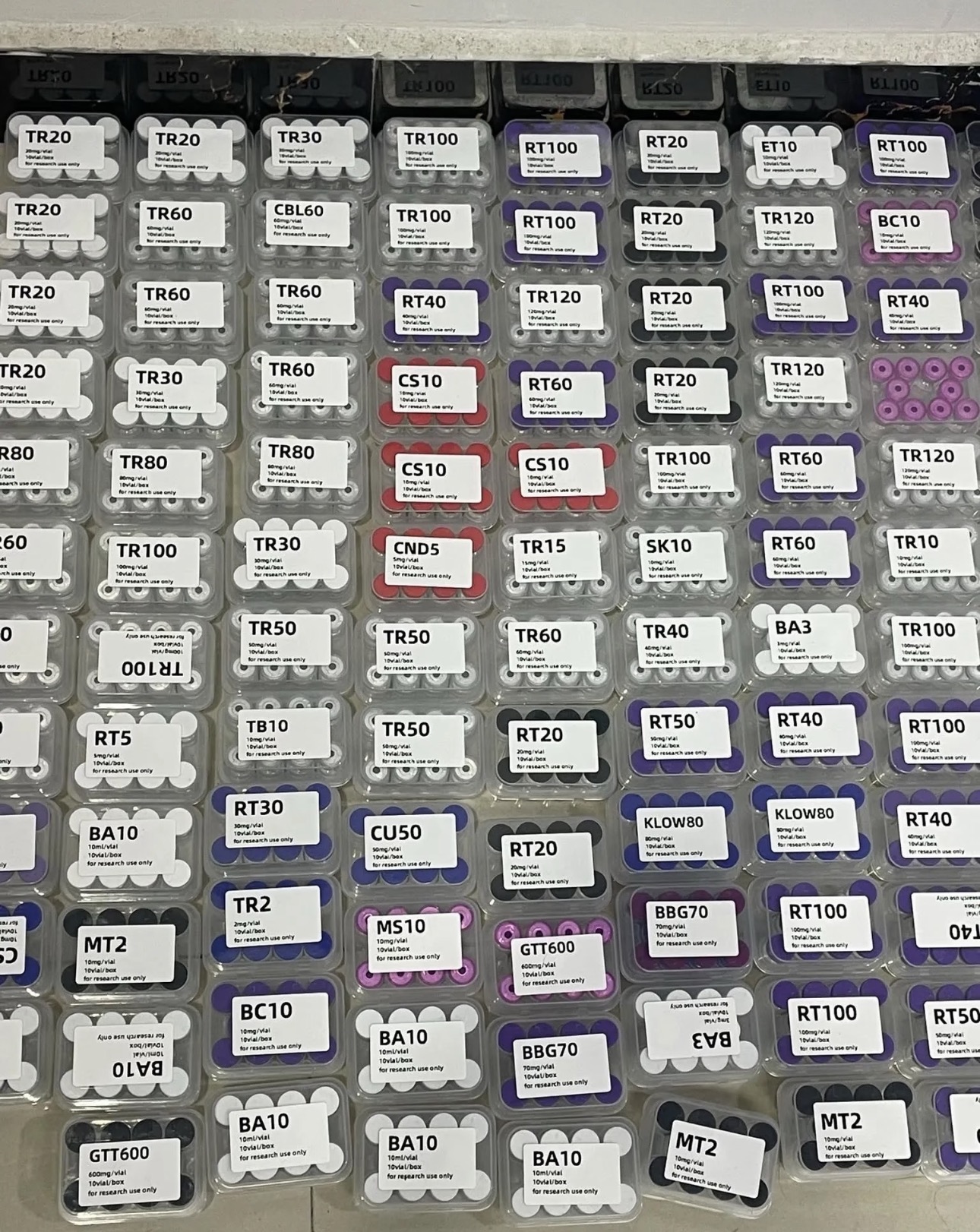Global research peptide warehouse with organized inventory prepared for worldwide shipping.